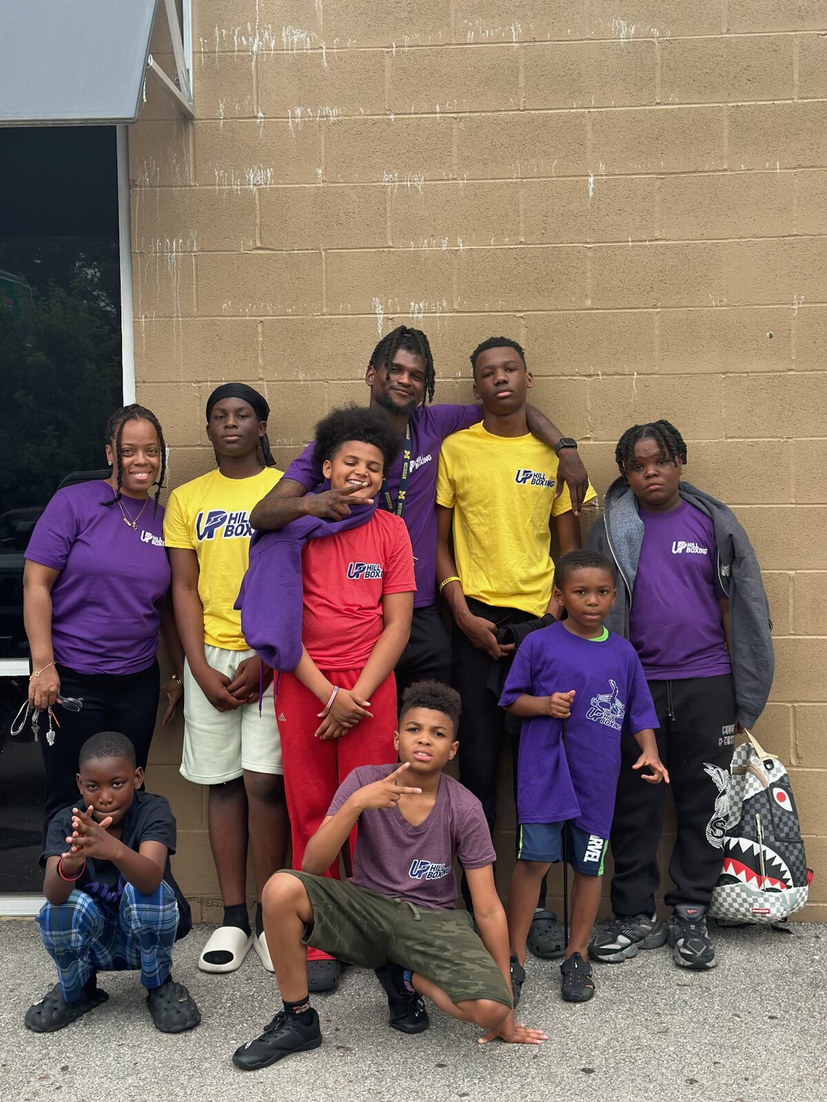 Coach Aja Greene with Uphill Boxing youth team members in Columbus, Ohio